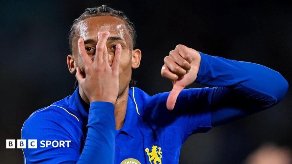 Joao Pedro partly covers his face with his hand