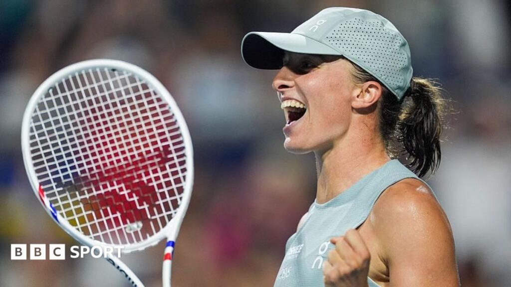Iga Swiatek celebrates celebrates winning a point during the Canadian Open