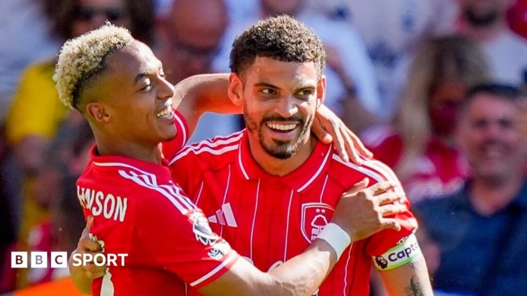 Omari Hutchinson and Morgan Gibbs-White hug in celebration