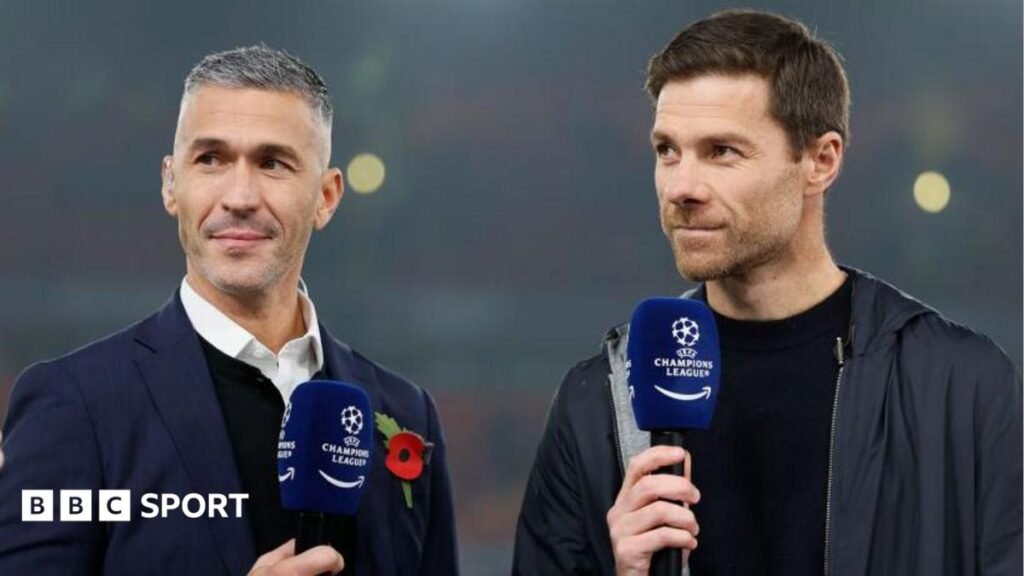Chelsea: Xabi Alonso reunites with Liverpool team-mate Luis Garcia in pre-season Luis Garcia and Xabi Alonso on a TV broadcast together holding Champions League-branded microphones