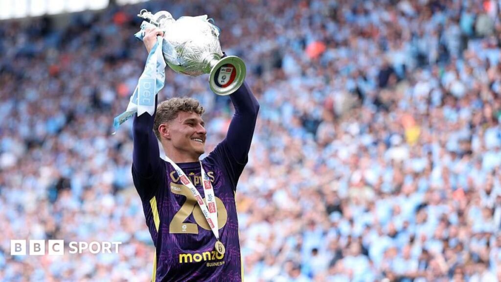 Coventry City: Carl Rushworth completes permanent move from Brighton Carl Rushworth holds the 2025-26 Championship trophy aloft