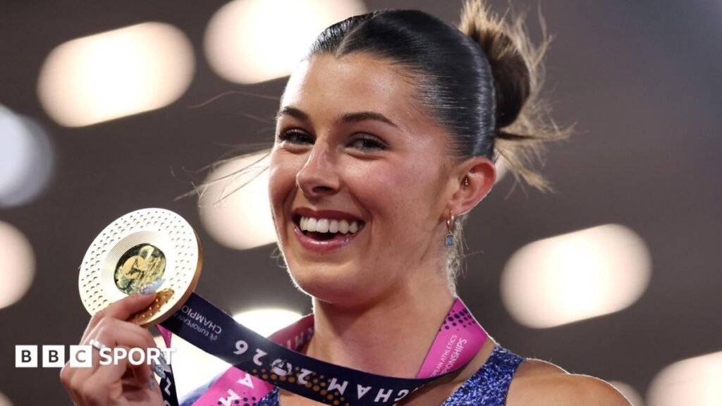 Amy Hunt celebrates with her gold medal in Birmingham