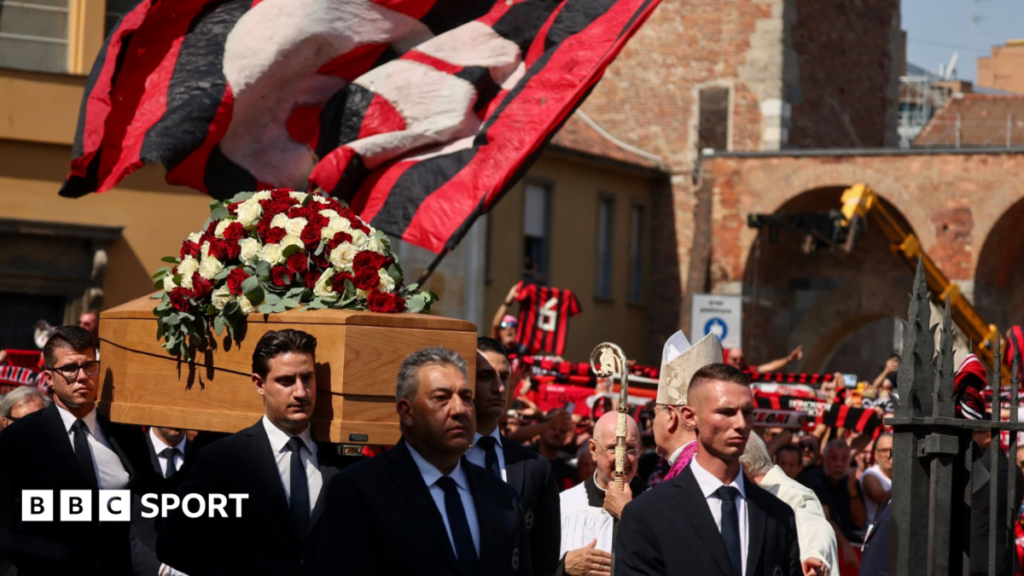 Pallbearers carry the coffin outside the Basilica of Sant'Ambrogio during the funeral of former AC Milan and Italy soccer player Franco Baresi