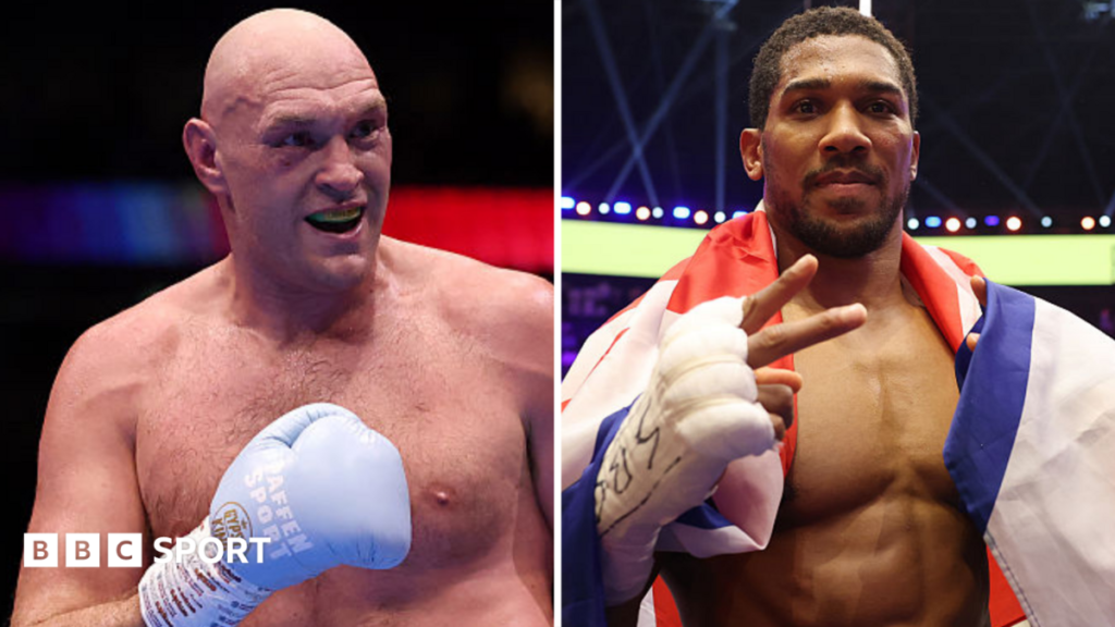 Joshua vs Fury: Anthony Joshua fight doesn’t look like it will happen – Tyson Fury Tyson Fury holds up his hand and is wearing a boxing glove and Anthony Joshua holds up two fingers and has a Union Jack over his shoulders