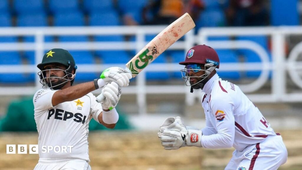 Babar Azam batting for Pakistan with West Indies wicketkeeper Shai Hope stood behind him