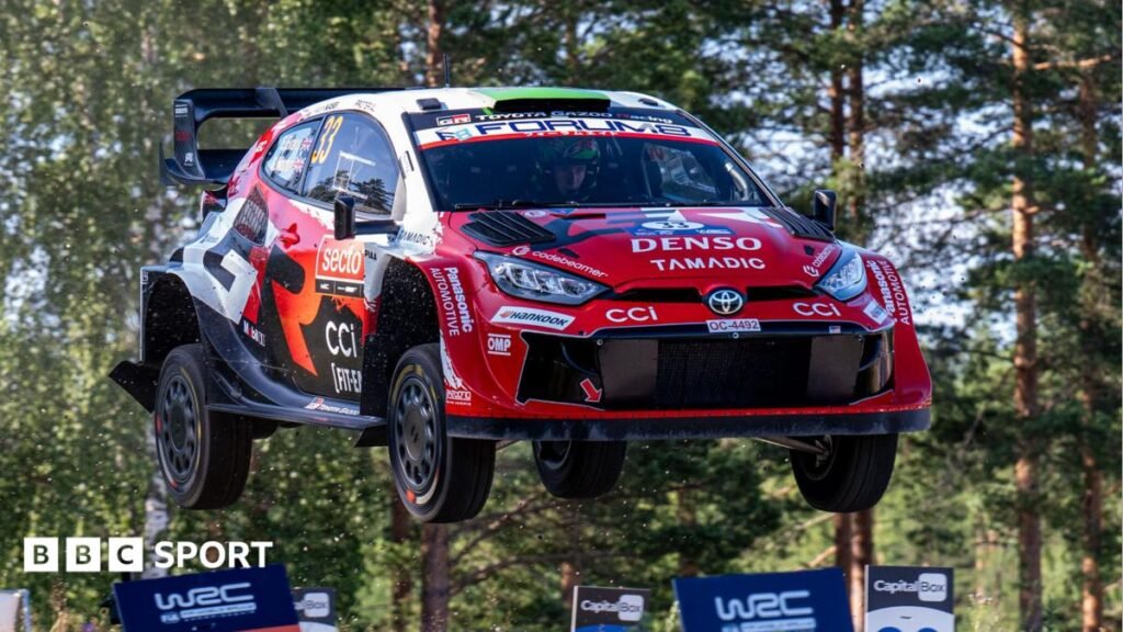 Rally Finland: Elfyn Evans third despite roll as Sebastien Ogier taken to hospital Elfyn Evans' Toyota in mid-air at Rally Finland
