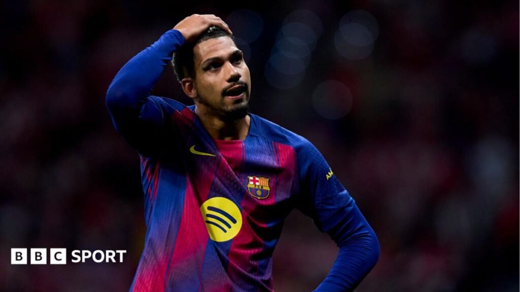 Ronald Araujo to Liverpool transfer: Why has he left Barcelona and what can he offer Reds? Ronald Araujo with his hand on his head