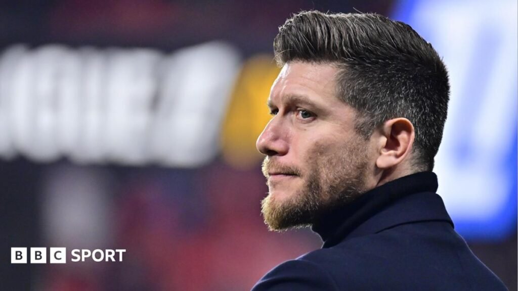 Scotland: Belgian Sebastien Pocognoli frontrunner to be new head coach Sebastien Pocognoli, pictured wearing a roll neck top, looks across to his left