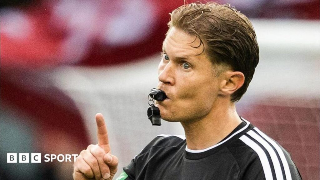 Scottish FA scraps key match incident panel Referee David Dickinson blows his whistle while raising an index finger