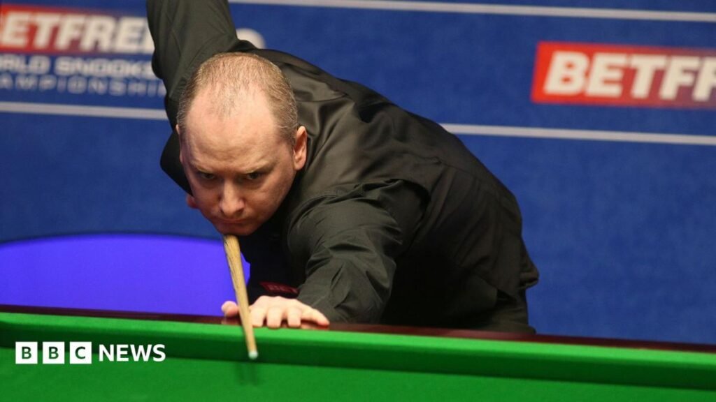 Snooker player Graeme Dott in court over child abuse allegations A balding man in a black shirt holds a snooker cue as he prepares to take a shot