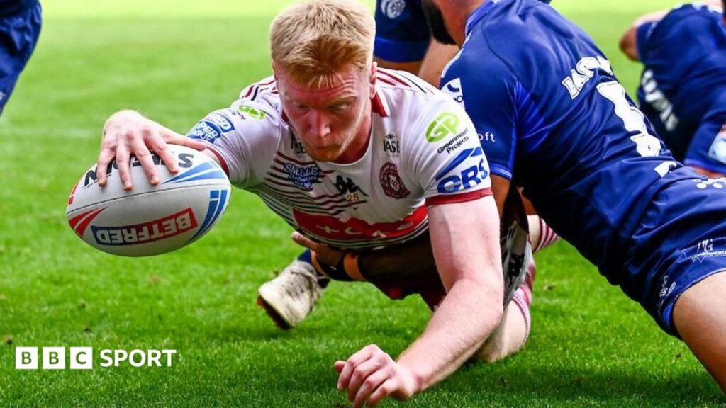 Super League: Wigan Warriors 48-18 Toulouse Olympique: Wigan win to climb to second Zach Eckersley extends his right arm to touch the ball down and score Wigan's opening try against Toulouse