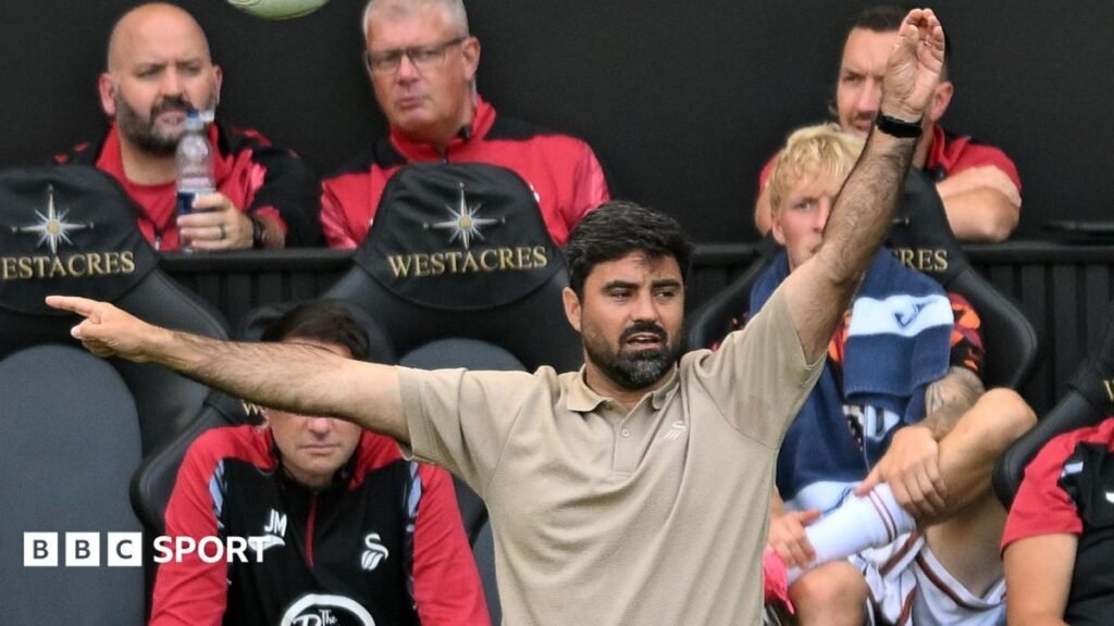 Vitor Matos signals on the touchline during Swansea's friendly against Leganes
