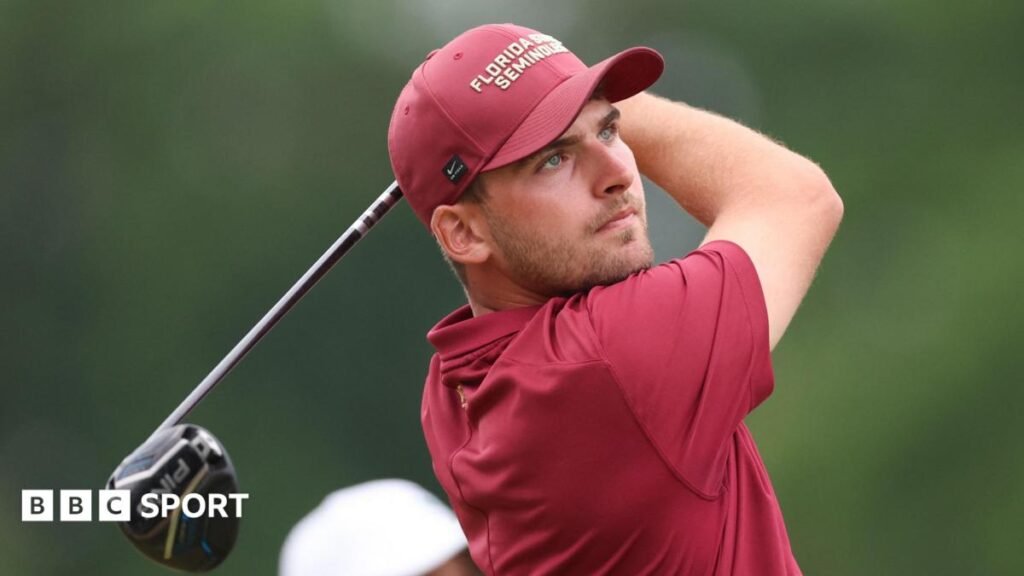 US Amateur golf: England’s Jack Whaley wins title and earns spot at 2027 Open, US Open and Masters Jack Whaley, in red golf shirt and cap, tees off and watches his shot