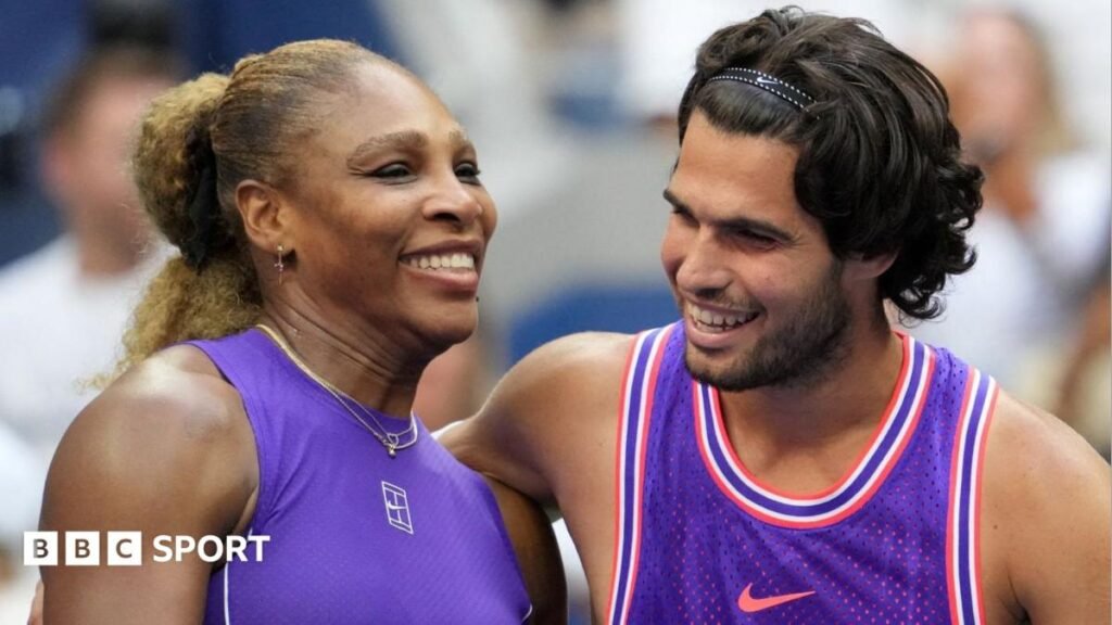 Serena Williams and Carlos Alcaraz laugh together during the US Open mixed doubles competition