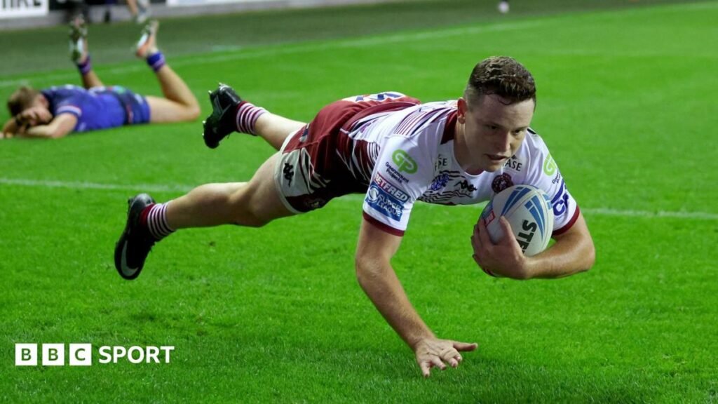 Wigan Warriors 26-12 Wakefield Trinity – Win sends hosts top of Super League table Jai Field scores a try for Wigan Warriors against Wakefield Trinity