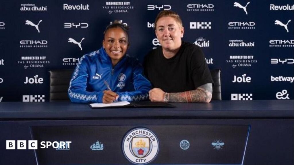 Manchester City defender Sacha Lewis as she signs her first professional contract