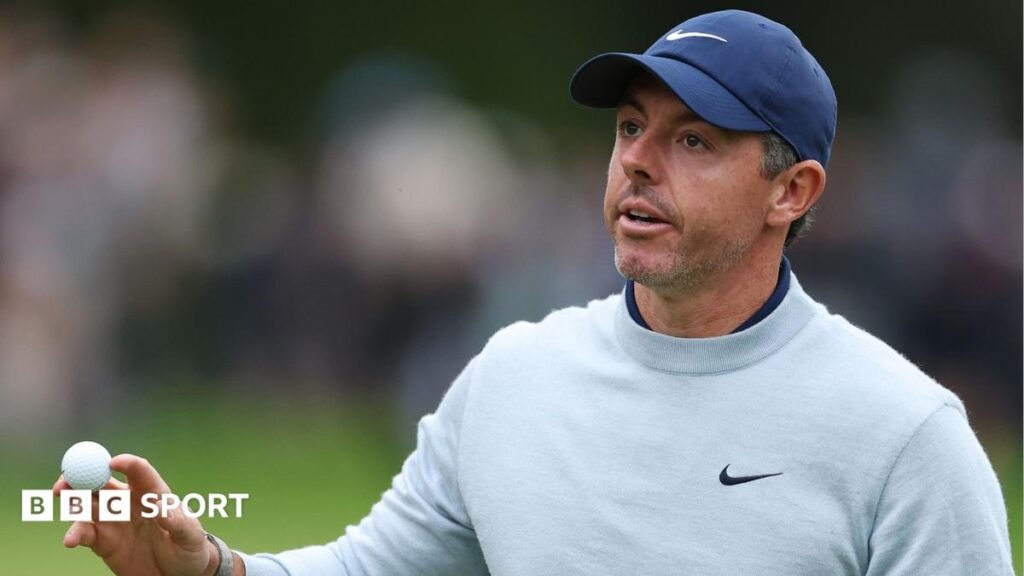 Rory McIlroy walks off a green