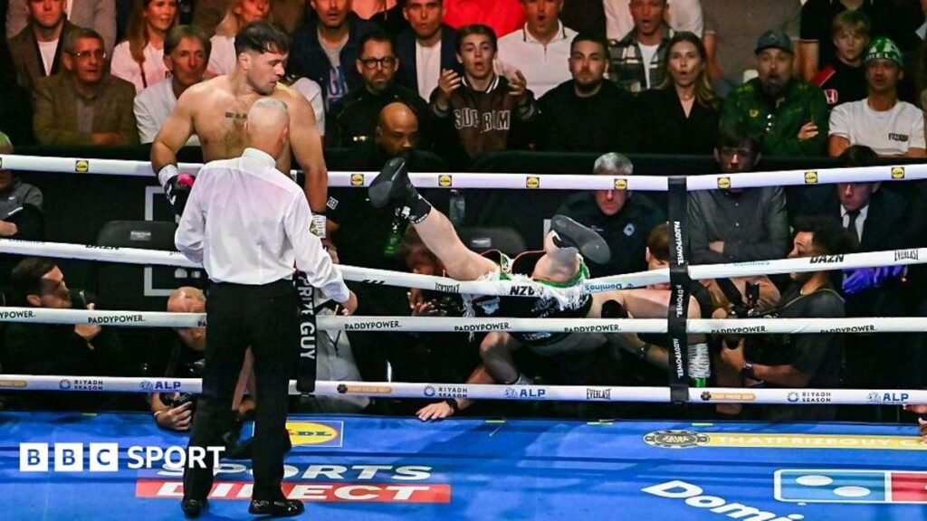 Boxing: David Allen’s ‘two illegal blows’ sent Thomas Carty through ‘loose ropes’ Thomas Carty falls through ropes as Dave Allen watches on