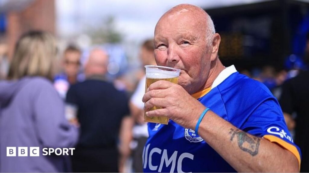 Drinking at football matches – would fans welcome it? An Everton fan drinks a beer before the Premier League match against Crystal Palace