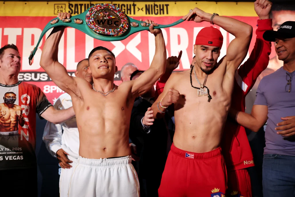 Isaac 'Pitbull' Cruz bares teeth in weigh-in debate with Nestor Bravo's team Abass Baraou BEATS Hometown Hero Santillan, Takes WBO Title