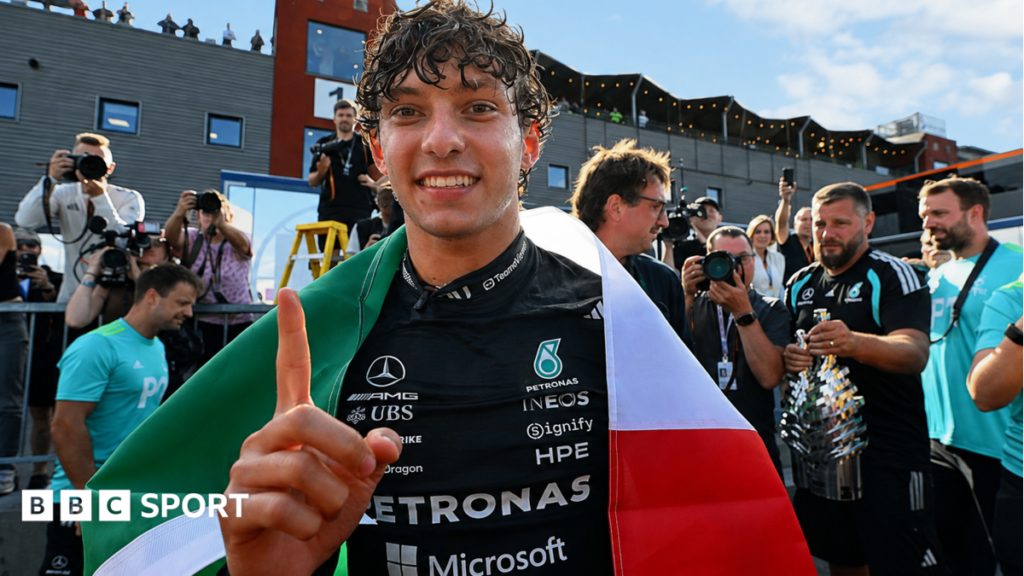Italian Grand Prix: Is ‘disruptor’ Kimi Antonelli winning hearts where Ferrari is Formula 1? Kimi Antonelli celebrates after winning the Belgium Grand Prix, with an Italian flag draped over his shoulders