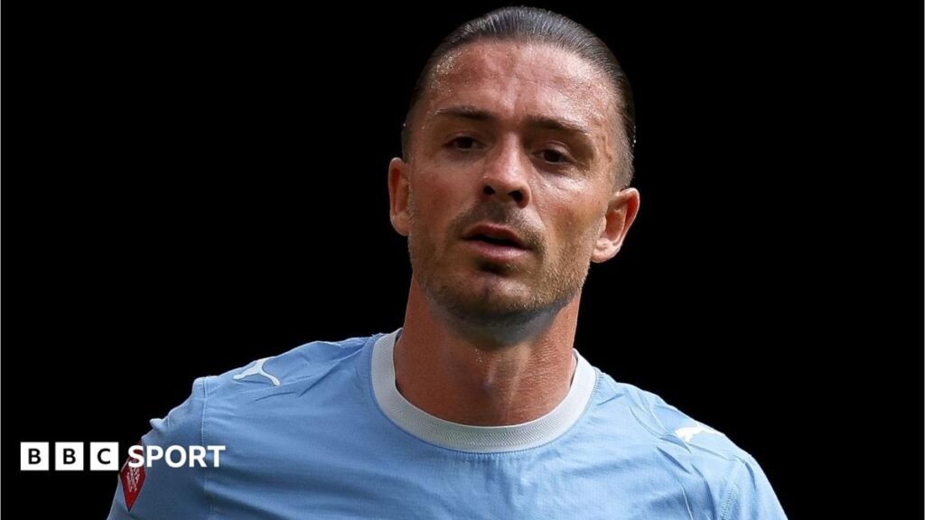 Jack Grealish transfer: Everton agree loan deal as Beto joins Fiorentina Jack Grealish, wearing Manchester City's sky blue kit, looks on during a match