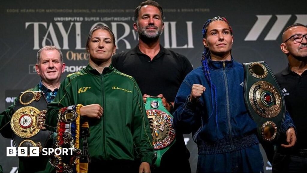 Katie Taylor and Flora Pili are flanked by Brian Peters and Eddie Hearn holding the light-welterweight world titles