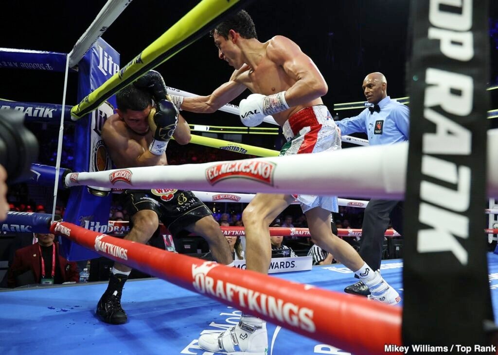Rafael Espinoza Trapped Beneath Boxing’s Bigger Names Rafael Espinoza throws a right hand at Edward Vazquez along the ropes during their featherweight bout at T-Mobile Arena in Las Vegas.