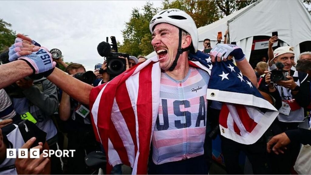 UCI Road World Championships: Brandon McNulty becomes first American winner in 33 years Brandon McNulty celebrating with the American flag after his win.