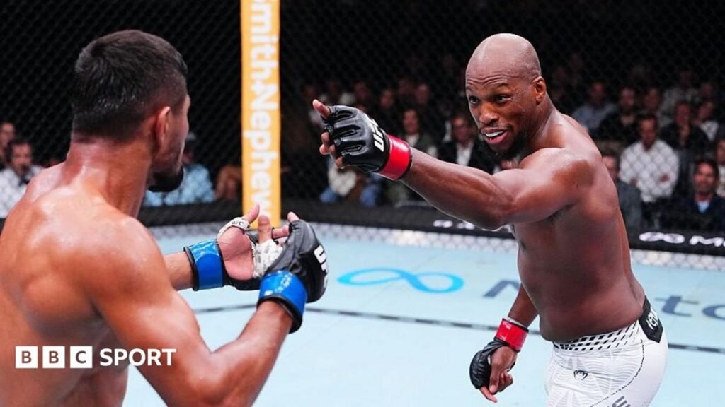 Michael 'Venom' Page in action against Nursulton Ruziboev at UFC Paris