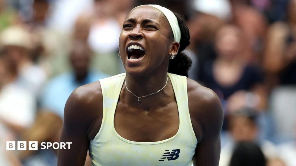 US Open 2026 results: Coco Gauff saves match points to beat Mirra Andreeva and set up Elena Rybakina semi-final Coco Gauff, wearing a pale yellow vest, puts her left index finger behind her ear