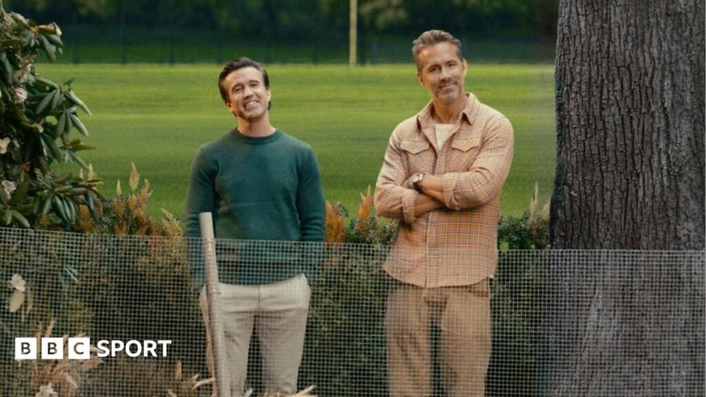 Wrexham owners Ryan Reynolds and Rob Mac aim Spygate dig at Southampton Rob Mac and Ryan Reynolds stand next to a tree