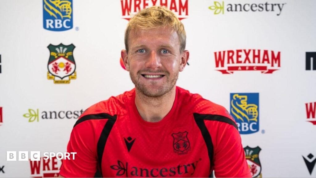 Wrexham transfer news: Joe Worrall joins from Burnley on two-year deal Joe Worrall pictured signing his Wrexham contract.