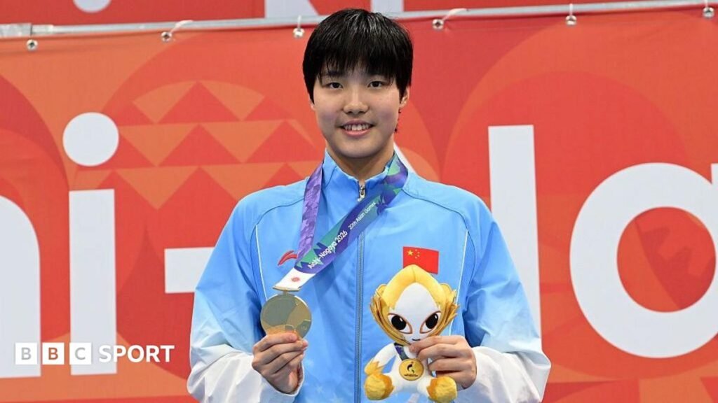 Yu Zidi, 13, wins record-breaking first major gold medal at Asian Games Yu Zidi of China wins gold medal after competing in the Women's 200m butterfly final on day one of the 20th Asian Games