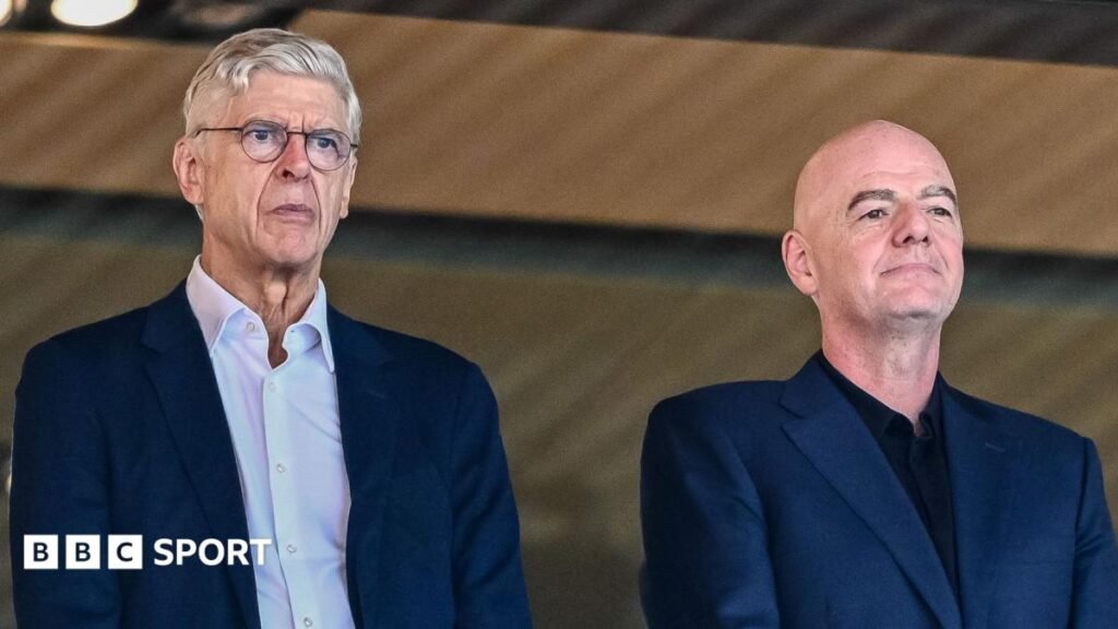 Arsene Wenger and Gianni Infantino stood alongside one another