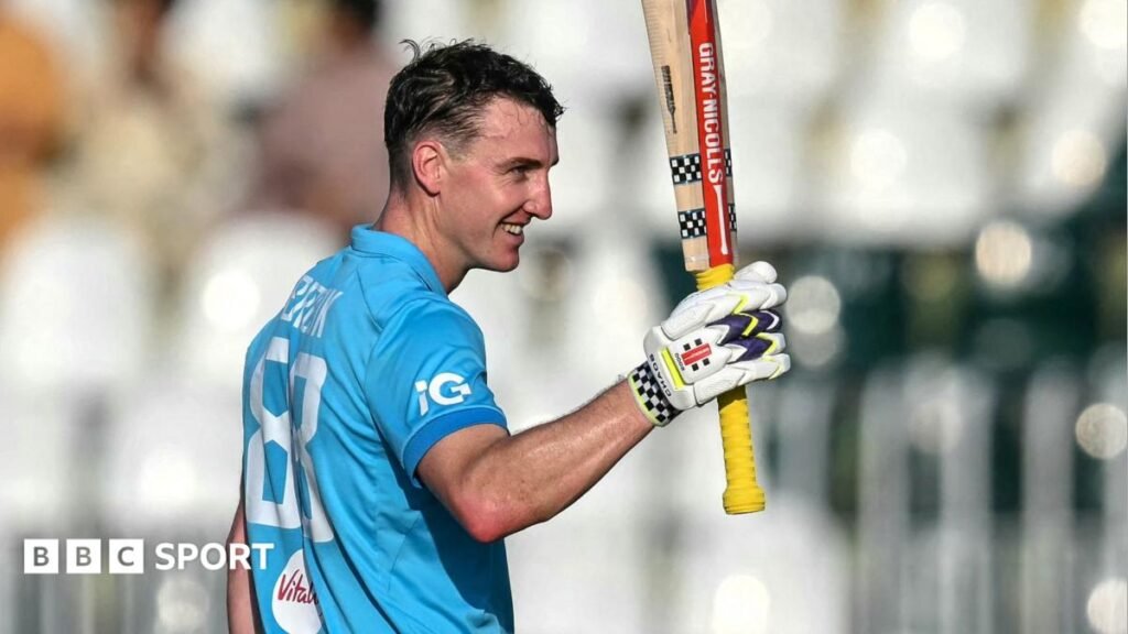 Harry Brook raises his bat