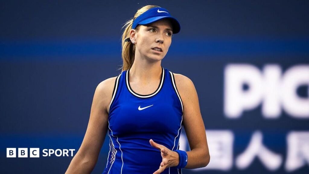 Katie Boulter in blue tennis kit