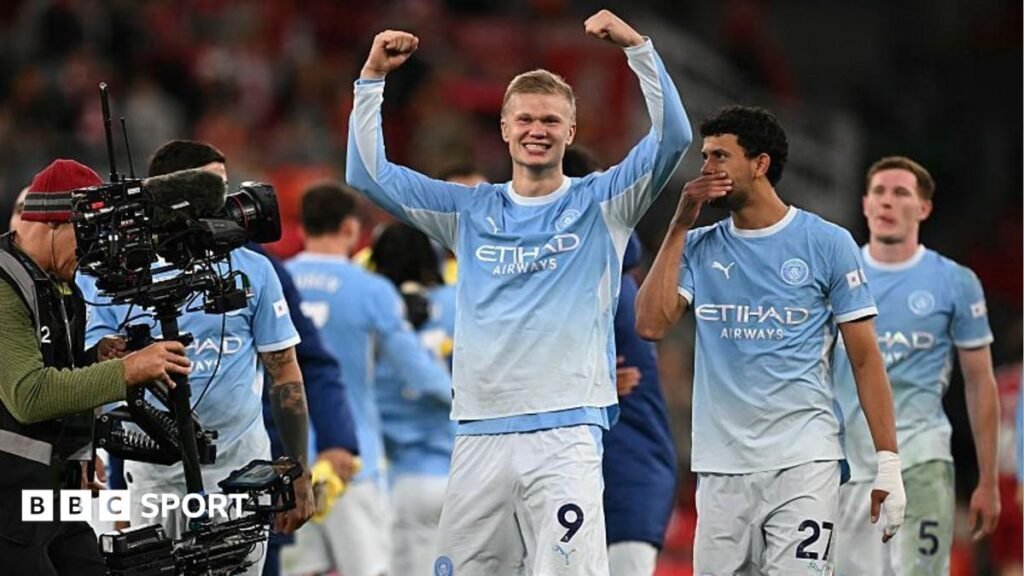 Liverpool fans holding up banners at Anfield calling Manchester City 'Cheatchester' and 'Shamchester'